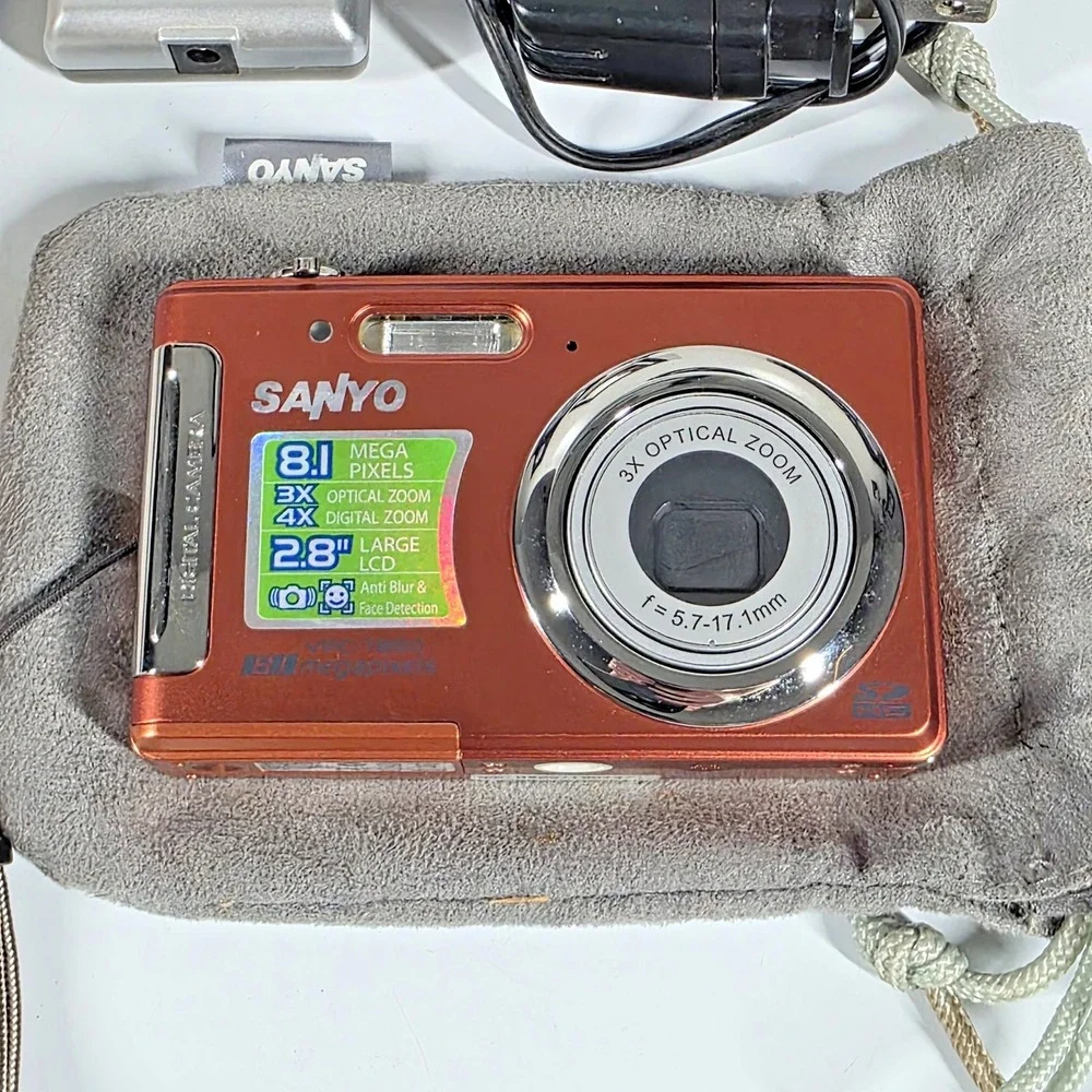 Sanyo VPC-T850 CP Digital Camera Orange w/Pouch, Battery, 2GB SD Card, Charger